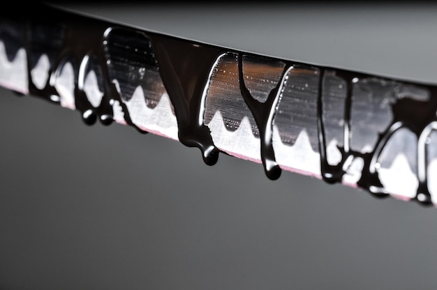 Foto sharp katana sword blade druipend zwarte kleur schilderij