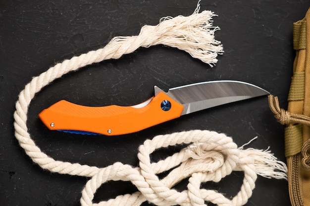 Sharp pocketknife on a black background