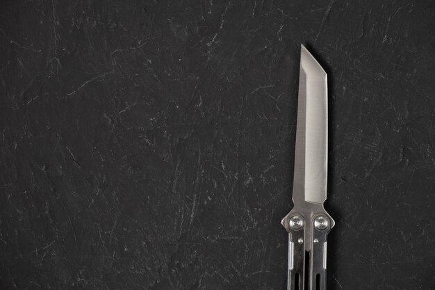 Sharp pocketknife on a black background