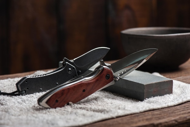 Sharpen the pocket knife with grindstone or whetstone pocket\
knife care and maintenance