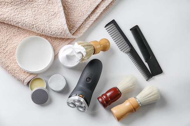 Shaving accessories for man on white background