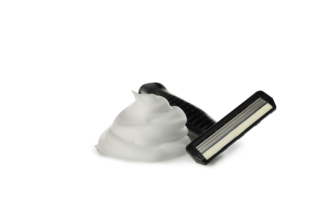 Photo shaving foam and razor isolated on white