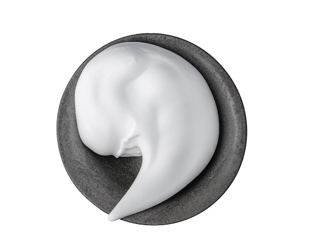 Shaving foam white cosmetic foam mousse cleanser in black ceramic bowl isolated on a white Top view