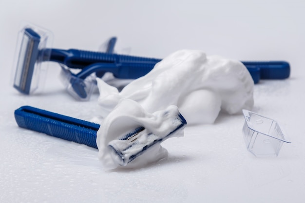 Shaving razors and foam