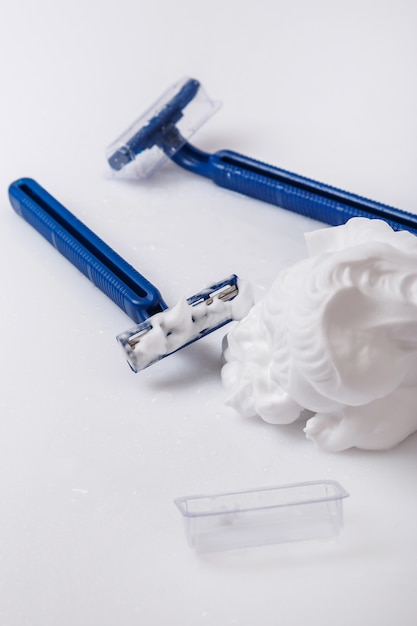 Shaving razors and foam