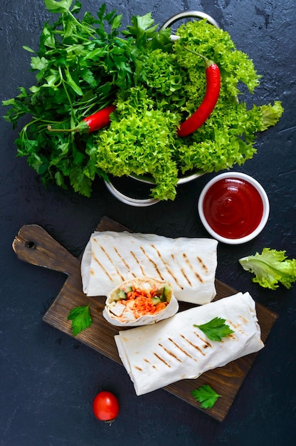 Shawarma sandwich Burritos wraps with grilled chicken and vegetables