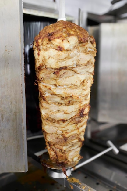 Photo shawarma.traditional turkish meat doner kebab. shawarma meat cooking