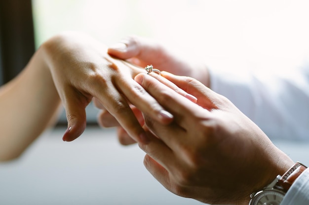 She said yes concept close up man making marriage proposal to\
girlfriend