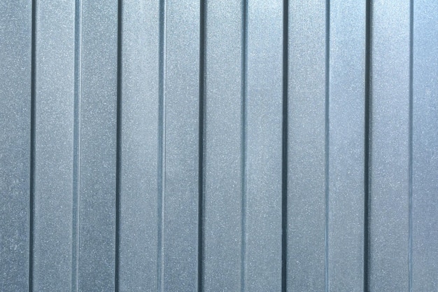 A sheet of galvanized metal is used to make a fence. metal texture