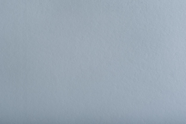 Photo sheet of gray paper clean gray background with smooth paper texture