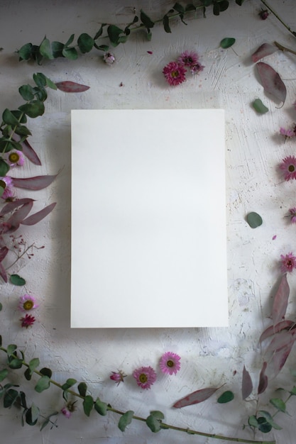 sheet of paper on a background of flowers