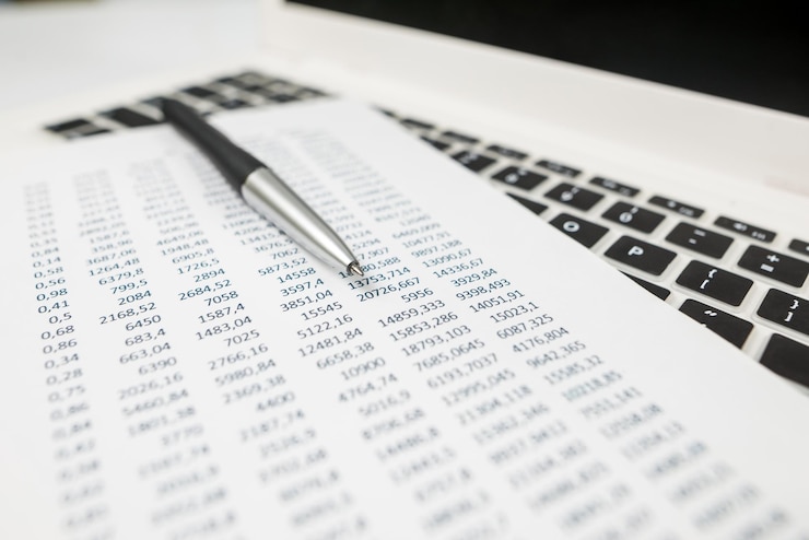 Photo sheet of paper with different financial figures the concept of analysis statistics