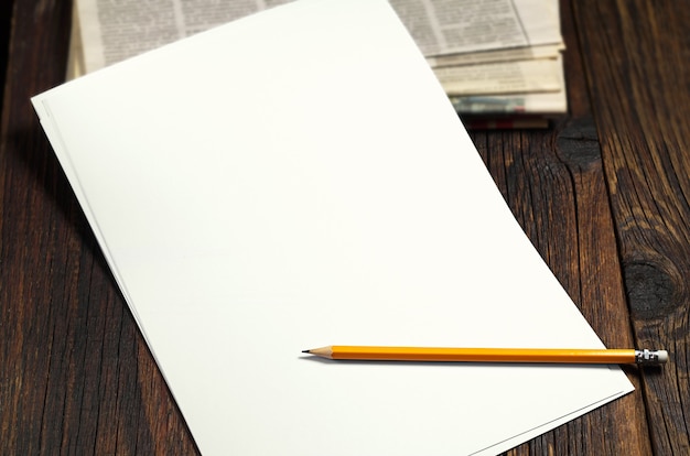 Sheet of paper on the wooden table