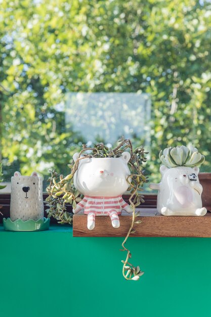 Shelf with animal pots