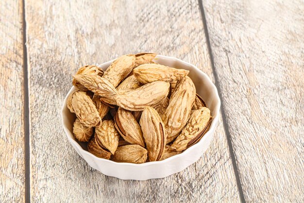 Shelled dry almond nut heap