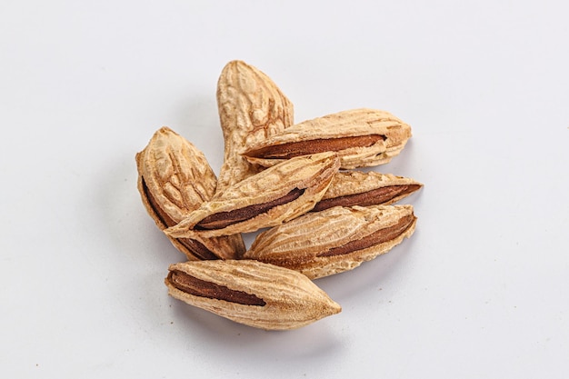 Photo shelled dry almond nut heap