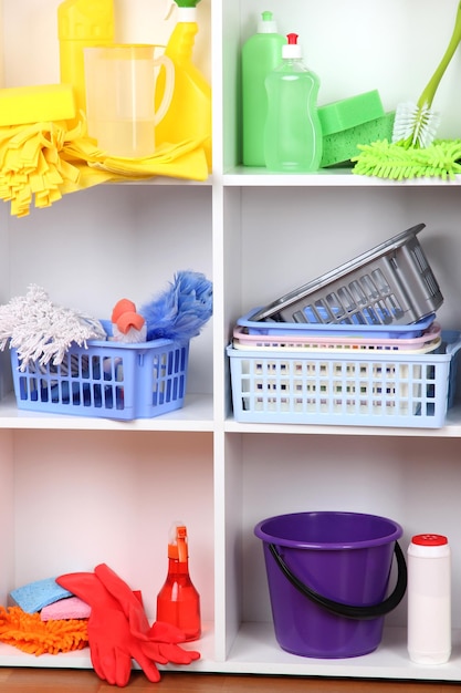 Photo shelves in pantry with cleaners for home closeup