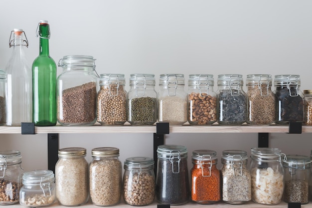 Shelves with glass jars filled with groceries