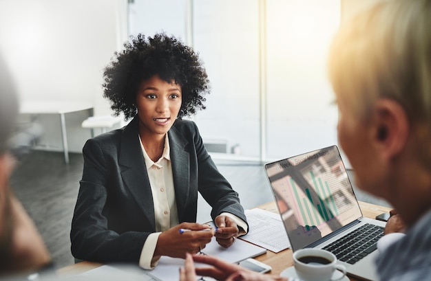 Shes got some great ideas to sell to the team Shot of a group of businesspeople having a meeting in an office