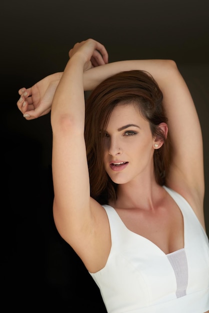 Shes simply mesmerising Studio portrait of an attractive young woman posing against a black background