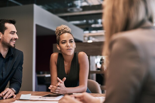 Shes the team manager who knows how to lead Shot of a group of businesspeople having a meeting in an office