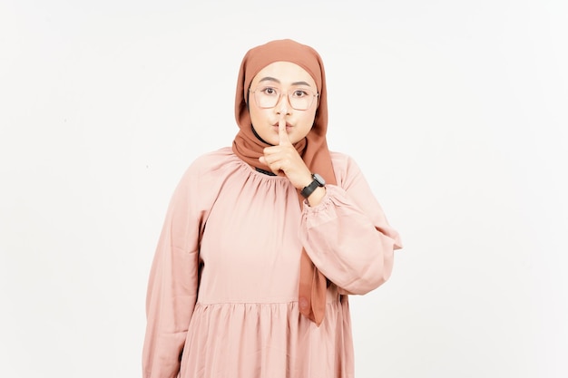 Shh Be Quiet of Beautiful Asian Woman Wearing Hijab Isolated On White Background