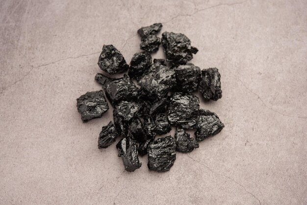 Photo shilajit is an ayurvedic medicine found primarily in the rocks of the himalayas selective focus