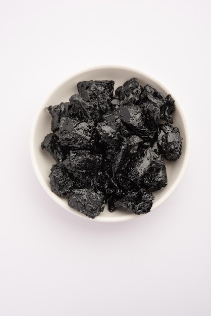 Shilajit is an ayurvedic medicine found primarily in the rocks of the Himalayas selective focus