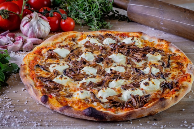 Shimeji mushroom and cream cheese pizza on the table