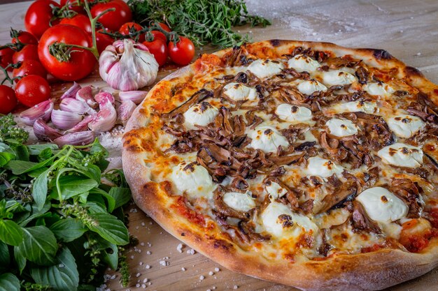 Shimeji mushroom and cream cheese pizza on the table