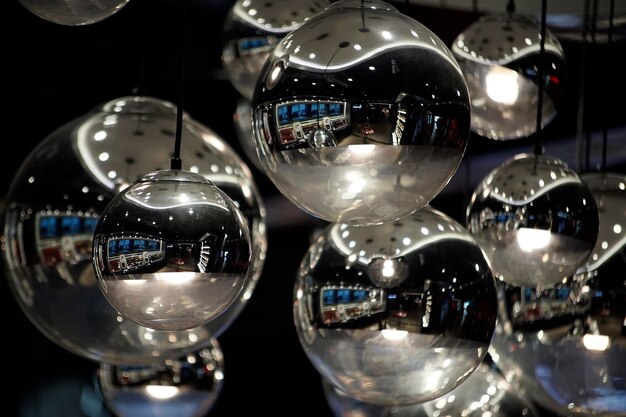 Shining hanging silver ball in a room