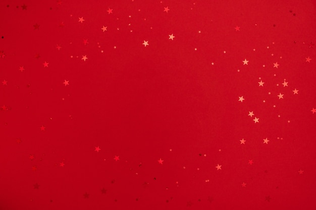 Shining stars on red background