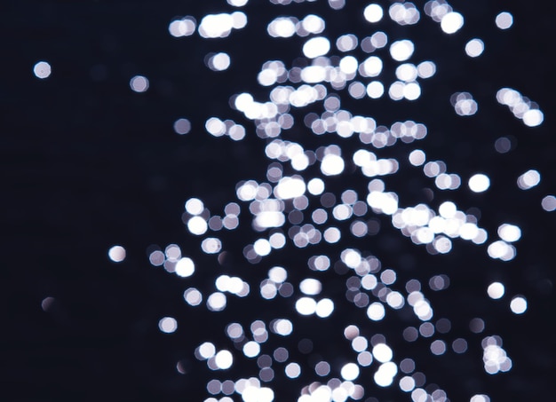 Shining water sparkles bokeh surface background