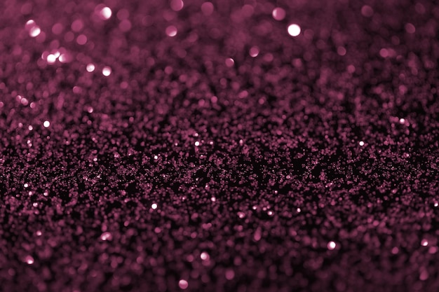 光沢のある抽象的な濃い紫色のキラキラ テクスチャ