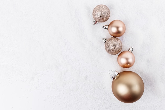 Shiny baubles lying on snow