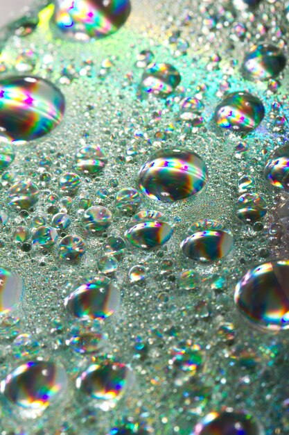 Shiny colorful drops of water