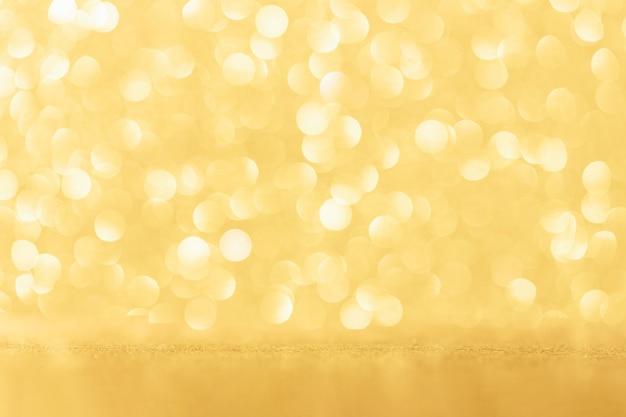 Shiny glittered bokeh gold background for Christmas and holidays template