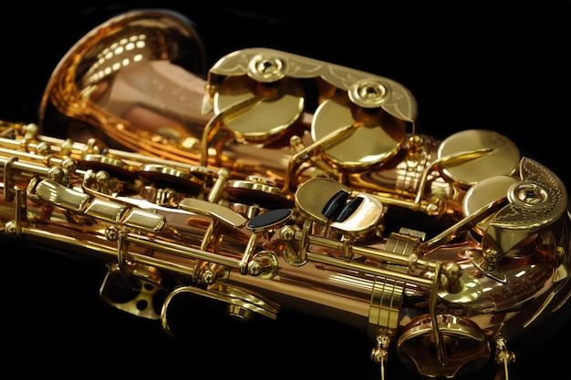 Shiny golden alto saxophone with detailed view of keys