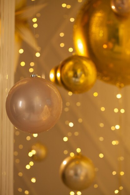 Shiny golden decoration on abstract bokeh glitter sparkle light background