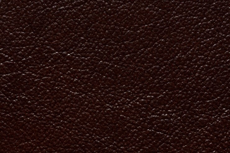 फोटो shiny leather texture in stylish brown colour