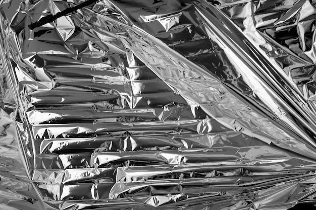 Shiny metal silver foil texture for background