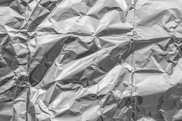 shiny metal silver gray foil crumpled texture background