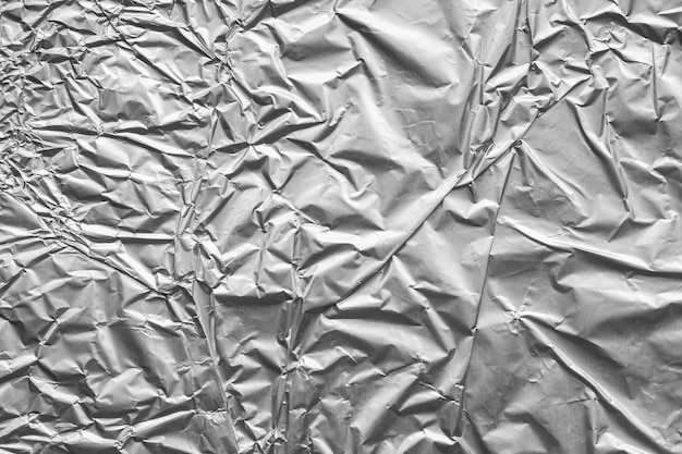 Shiny metal silver gray foil crumpled texture