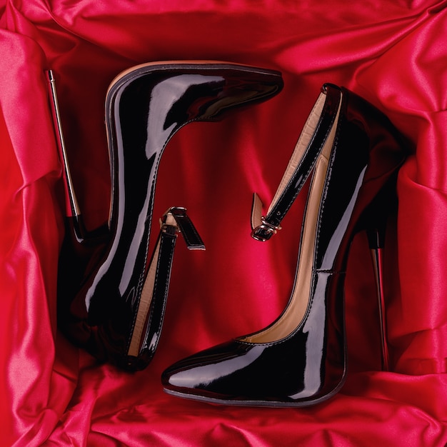 Shiny patent leather stiletto high heels with ankle strap