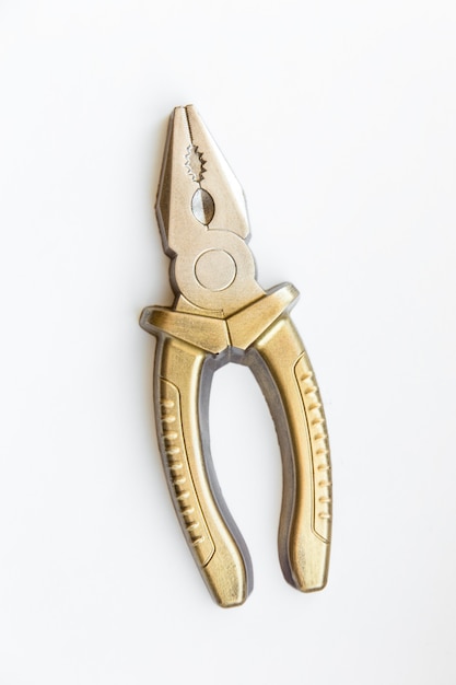 Shiny pliers made of beautiful chocolate candy