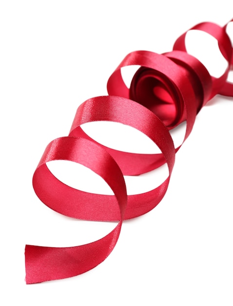 Photo shiny red ribbon isolated on white surface