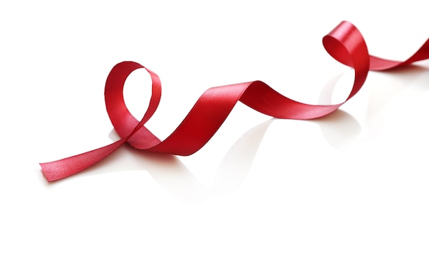 Shiny red satin ribbon isolated 