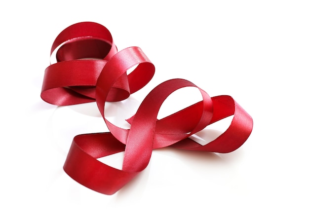 Shiny red satin ribbon isolated 