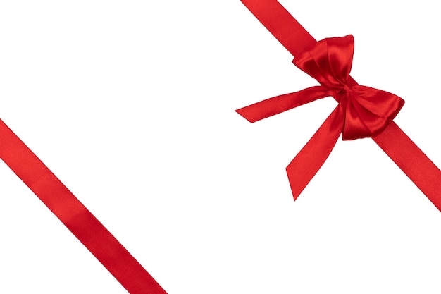 Shiny red silk ribbon isolated on white background. Gift box abstraction