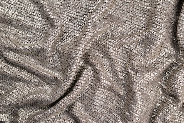 Текстура блестящей серебряной ткани